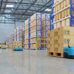 Robots efficiently sorting hundreds of parcels per hour,pallet lifter AGV.3d rendering